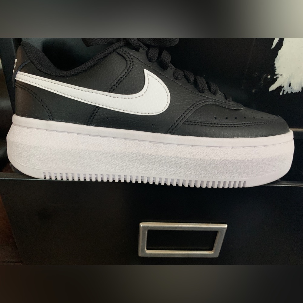 Womens. Size 8. Nike platforms. Never worn! Never touched the ground! Black.